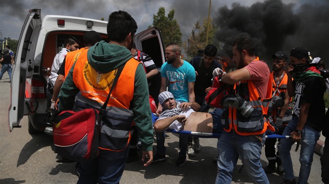 İşgalci İsrail'in saldırılarında binlerce Filistinli yaralandı.