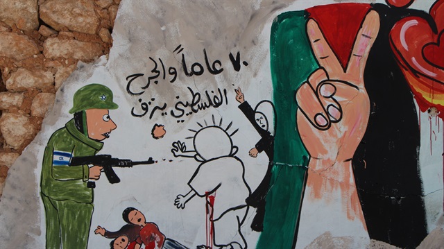 فنان جرافيتي سوري يتضامن مع شهداء غزة بلوحات مناهضة لإسرائيل