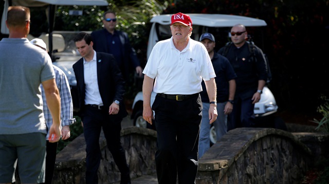 File Photo: U.S. President Donald Trump arrives to play host to members of the U.S. Coast Guard he invited to play golf at his Trump International Golf Club in West Palm Beach, Florida, U.S., December 29, 2017.
