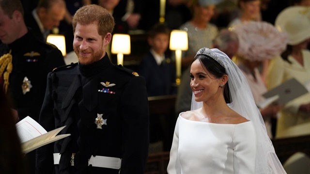 Prince Harry and Meghan Markle in St George's Chapel at Windsor Castle during their wedding service in Windsor, Britain, May 19, 2018. 