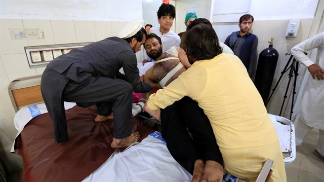 An injured man receives treatment in a hospital, after blasts at a sports stadium, in Jalalabad city, Afghanistan May 19, 2018. 