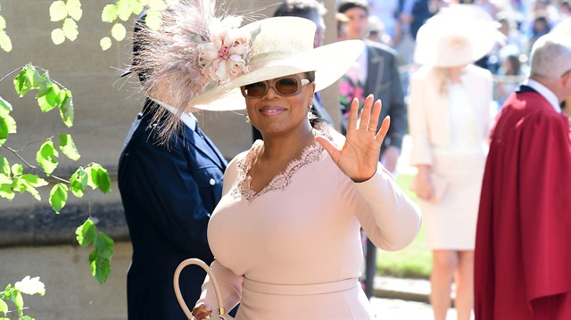 Oprah Winfrey arrives at St George's Chapel at Windsor Castle for the wedding of Meghan Markle and Prince Harry. Saturday May 19, 2018. 