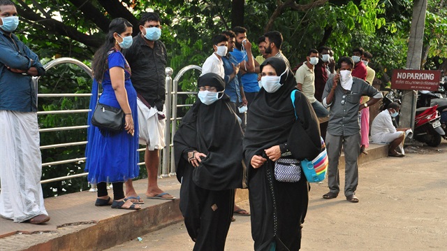 People wearing masks are seen at a hospital in Kozhikode in the southern state of Kerala, India May 21, 2018. 