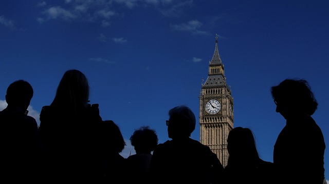 File Photo: Tourists view the Elizabeth Tower, which houses the Great Clock and the 'Big Ben' bell, at the Houses of Parliament, in central London, Britain, August 16, 2017. 