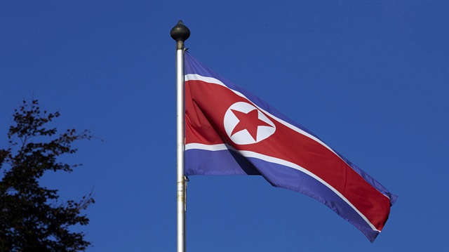 File Photo: North Korean flag flying on a mast at the Permanent Mission of North Korea in Geneva