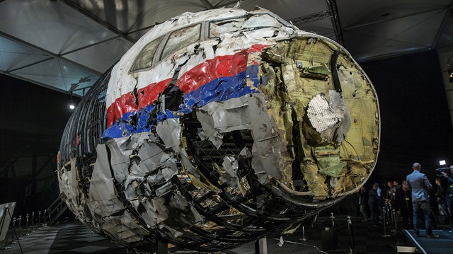 The reconstructed wreckage of Malaysia Airlines flight MH17 which crashed over Ukraine in July 2014 is seen in Gilze Rijen, Netherlands, October 13, 2015. 