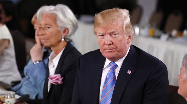 U.S. President Donald Trump and Managing Director of the International Monetary Fund Christine Lagarde attend a G7 and Gender Equality Advisory Council meeting as part of a G7 summit in the Charlevoix city of La Malbaie, Quebec, Canada, June 9, 2018. 