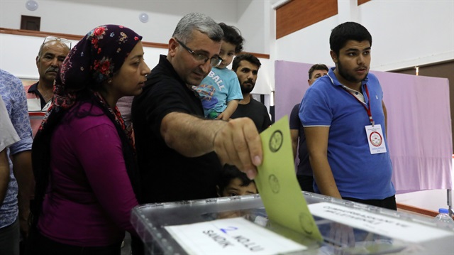 Turkish voters cast their ballots for Turkey's presidential elections in the Turkish Cypriot northern part of the divided city of Nicosia, Cyprus June 16, 2018. 