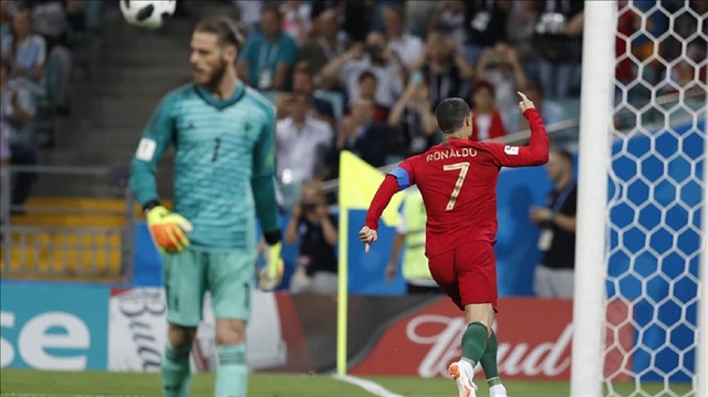 Cristiano Ronaldo of Portugal celebrates after scoring a penalty shot during the 2018 FIFA World Cup Russia Group B match between Portugal and Spain at the Fisht Stadium in Sochi, Russia on June 15, 2018.