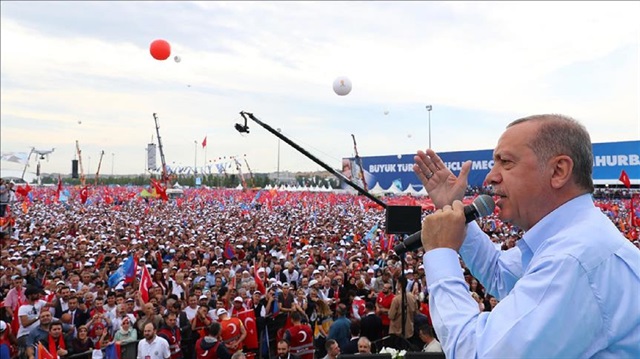President of Turkey and the leader of the Justice and Development Party (AK Party) Recep Tayyip Erdogan (R) addresses during Turkey's ruling AK Party’s mega rally at the Yenikapi Square in Istanbul, Turkey on June 17, 2018. 