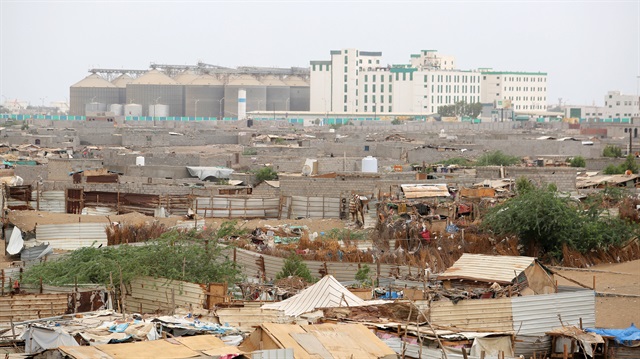 File Photo: Hodeidah port's grain silos are pictured from a nearby shantytown in Hodeidah, Yemen June 16, 2018