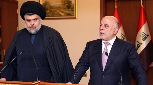 Iraqi Prime Minister Haider al-Abadi and prominent Shia cleric and politician Muqtada al-Sadr