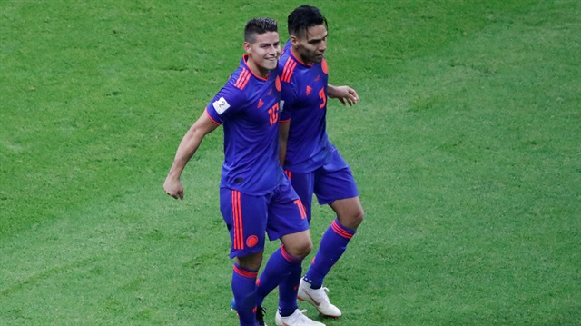 Colombia's Radamel Falcao celebrates scoring their second goal with James Rodriguez