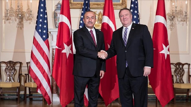 Turkish Foreign Minister Mevlüt Çavuşoğlu (L) shakes hands with his US counterpart Mike Pompeo (R) ahead of their meeting in Washington, United States on June 4, 2018.