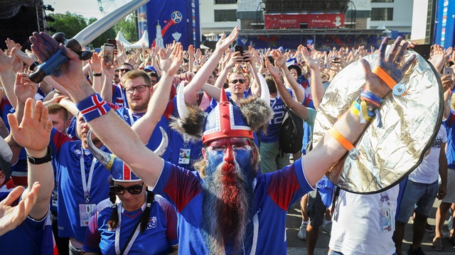 File Photo: Iceland fans cheer as they gather ahead of a match.