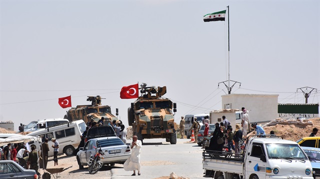 Armoured vehicles of Turkish Armed Forces patrolling in the northern Syrian city of Manbij on June 22, 2018. Turkish Armed Forces on Friday completed their third round of patrolling in the northern Syrian city of Manbij as part of a deal with the U.S. to rid the area of the YPG/PKK terror group.