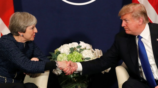 U.S. President Donald Trump shake hands with Britain's Prime Minister Theresa May 