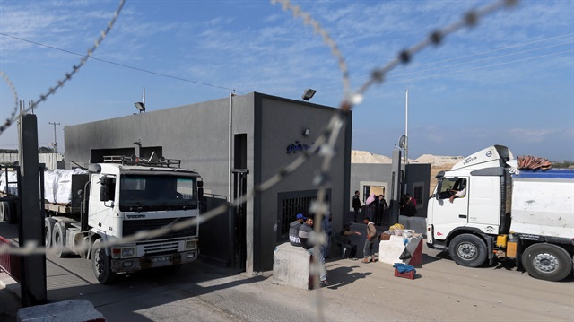 File Photo: Trucks carrying goods are seen at Kerem Shalom crossing in Rafah in the southern Gaza Strip