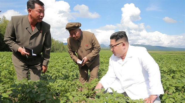 North Korea leader Kim Jong Un inspects Chunghung farm in Samjiyon County in this undated photo released by North Korea's Korean Central News Agency.