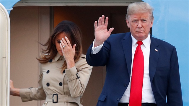 U.S. President Donald Trump and first lady Melania Trump arrive aboard Air Force One ahead of the NATO Summit, at Brussels Military Airport in Melsbroek, Belgium.