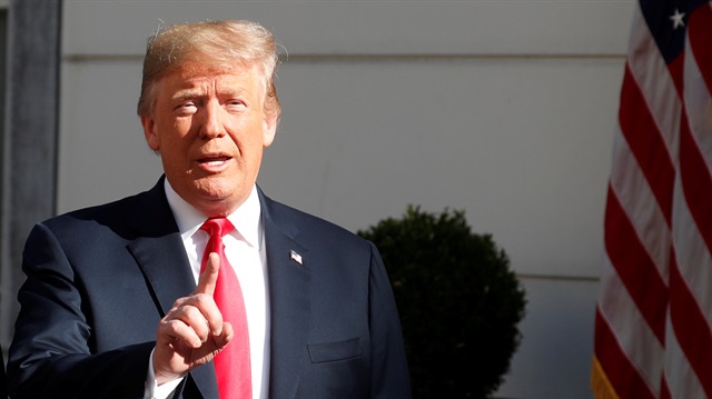 U.S. President Donald Trump gestures as he is greeted by NATO Secretary General Jens Stoltenberg before a bilateral breakfast ahead of the NATO Summit in Brussels, Belgium July 11, 2018.