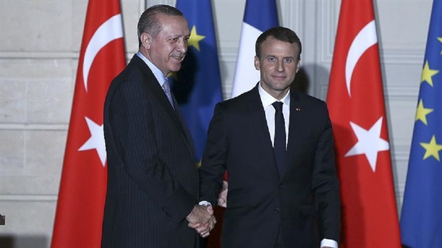 أردوغان رفقة الرئيس الفرنسي إيمانويل ماكرون