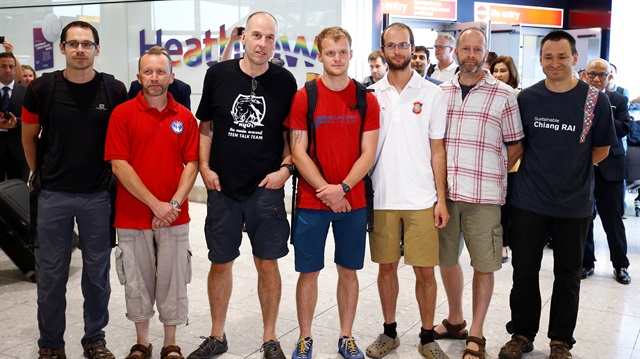British cave divers, Rick Stanton, Chris Jewell, Connor Roe, Josh Bratchley, Jim Warny, Mike Clayton and Gary Mitchell, arrive back at Heathrow Airport, having helped in the rescue of the 12 boys in Thailand, in London, Britain, July 13, 2018.