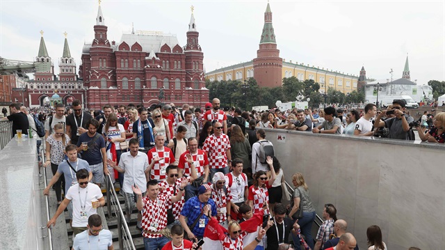 World Cup - Final - France v Croatia - Moscow, Russia - July 15, 2018 Supporters of team Croatia enter the Okhotny Ryad metro station before the match.