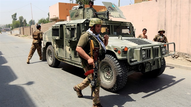 Afghan security forces arrive at the site of gunfire and attack in Jalalabad city, Afghanistan July 11, 2018. 
