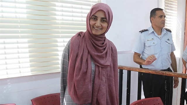 التركية أوزكان تعود لوطنها عقب اعتقال الاحتلال لها منذ شهر