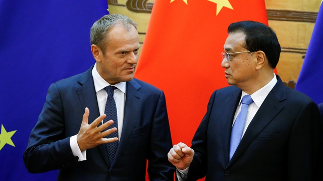 European Council President Donald Tusk and Chinese Premier Li Keqiang attend signing ceremony at the Great Hall of the People in Beijing, China.