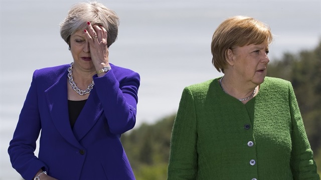 UK Prime Minister Theresa May (left) and German Chancellor Angela Merkel (right)