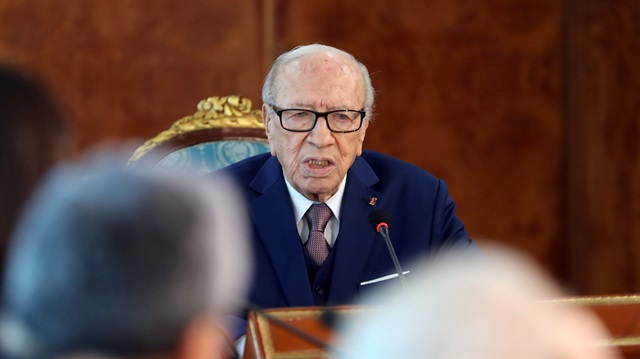 File photo: Tunisia's President Beji Caid Essebsis speaks during a meeting 