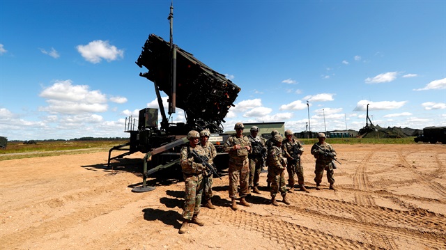 U.S. soldiers stand next to the long-range air dfence system Patriot during Toburq Legacy 2017 air defence exercise in the military airfield near Siauliai, Lithuania, July 20, 2017. 