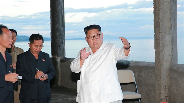 North Korean leader Kim Jong-un gives field guidance during his visit to the under construction Yombunjin Hotel in this undated photo released by North Korea's Korean Central News Agency (KCNA) in Pyongyang.