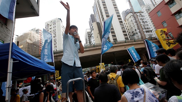 File Photo: Pro-democracy activist Joshua Wong wave to supporters during a protest march in Hong Kong, China July 1, 2018, the day marking the 21st anniversary of the city's handover to Chinese sovereignty from British rule.