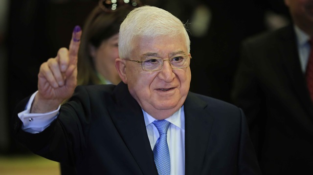 File photo: Iraq's President Fuad Masum casts his vote for parliamentary election