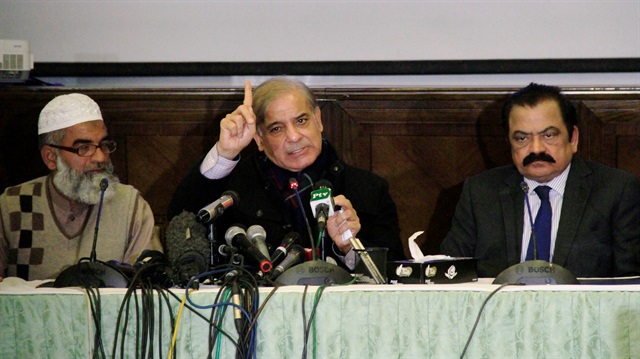Punjab Chief Minister Shehbaz Sharif (C)