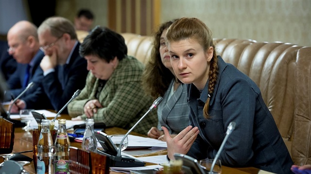 Public figure Maria Butina (R) attends a meeting of a group of experts, affiliated to the Russian government.