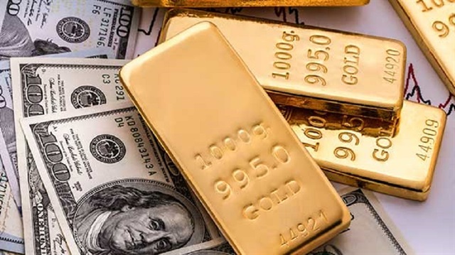 صعود الدولار يهبط بالذهب لأدنى مستوى خلال عام