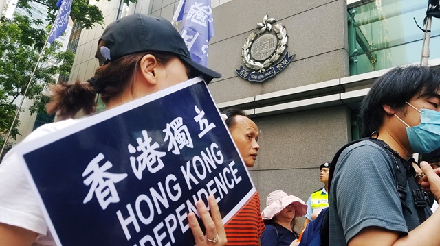 Pro-independence protesters supporting freedom of expression take part in a demonstration outside the Police Headquarters in Hong Kong, China.