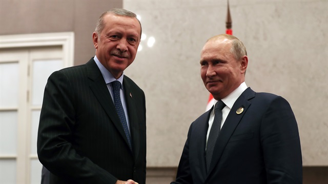 Turkish President Erdoğan in South Africa meets with Russia's President Vladimir Putin 
