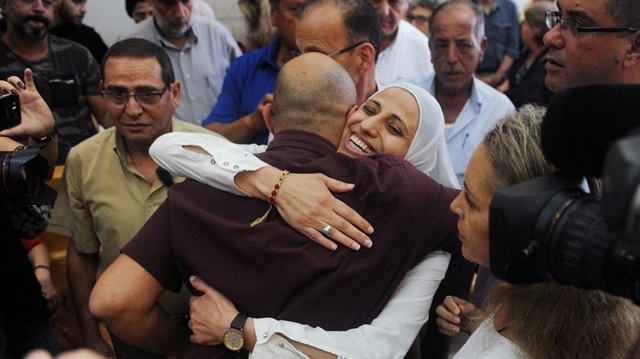 Arab-Israeli poet Dareen Tatour, 35, reacts at the magistrate court after being sentenced to five months in prison, in Nazareth, Israel