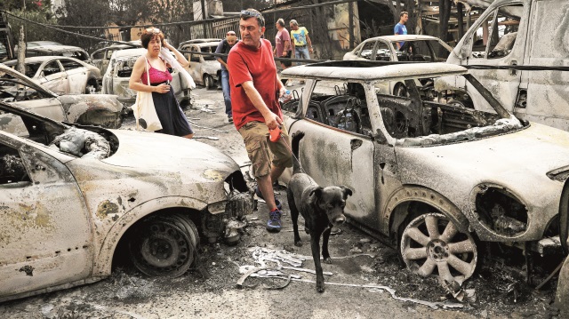 Yunanistan'daki yangın faciasında 91 kişi hayatını kaybetmişti.