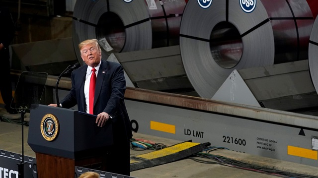 FILE PHOTO: U.S. President Donald Trump speaks about trade at the Granite City Works steel coil warehouse in Granite City, Illinois, U.S.