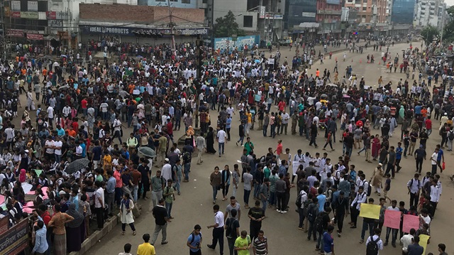 People and students protest over recent traffic accidents that killed a boy and a girl, in Dhaka, Bangladesh