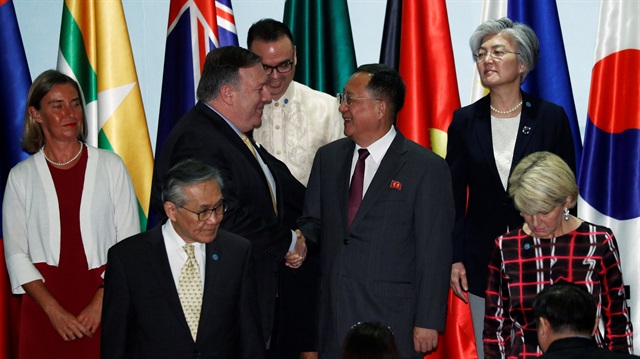 U.S. Secretary of State Mike Pompeo shakes hands with North Korea's Foreign Minister Ri Yong Ho at the Asean Regional Forum Retreat in Singapore