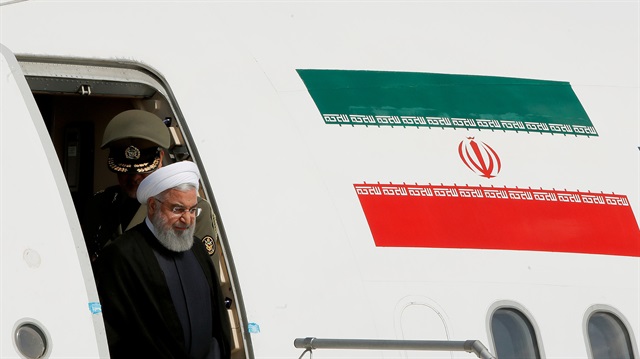 FILE PHOTO: Iranian President Hassan Rouhani disembarks from a plane upon his arrival at the airport in Zurich, Switzerland.