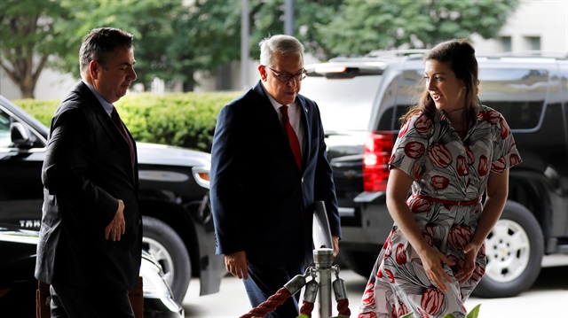 Turkish Deputy Foreign Minister Sedat Önal (L) and ambassador to the U.S. Serdar Kılıç arrive at State Department in Washington
