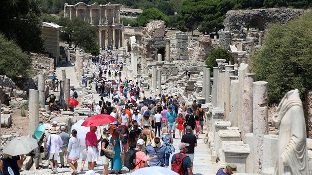 Tourists visit the ancient city of Ephesus near Izmir in the western Aegean region